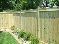 <b>Vertical Board Wood Privacy Fence withNew England Caps and Fascia Board top and bottom</b>
